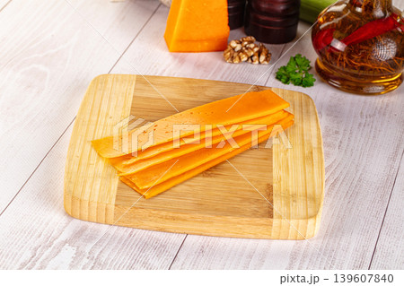 Yellow cheddae cheese slices snack Yellow cheddae cheese slices snack 139607840