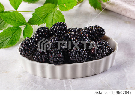Raw sweet juicy blackberry in the bowl 139607845