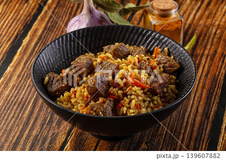 Asian traditional pilaf with beef 139607882