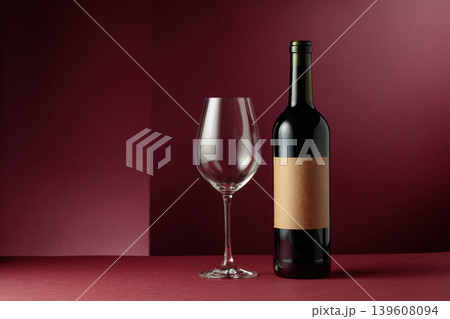 Red wine on a dark red background. 139608094