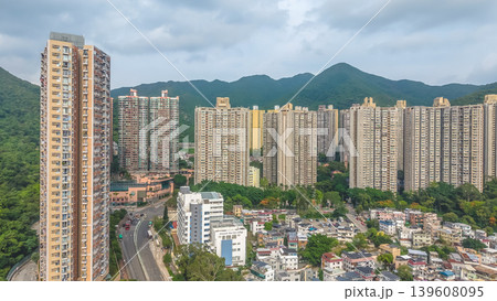 Sha Tin residential towers beside green mountains skyline Sha Tin residential towers beside green mountains skyline 139608095