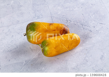Ripe juicy yellow carrots roots Ripe juicy yellow carrots roots 139608428