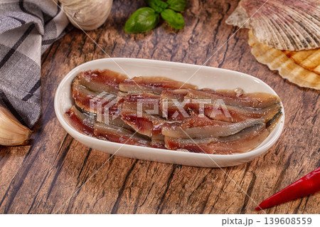 Marinated Anchovy Fillets Rustic Dish Garlic Basil Red Chili Scallop Shells Wood Background Marinated Anchovy Fillets Rustic Dish Garlic Basil Red Chili Scallop Shells Wood Background 139608559