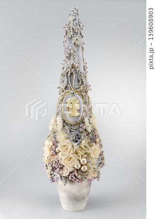 Christmas tree table handmade arrangement mini decoration for new year artificial on white background isolated Christmas tree table handmade arrangement mini decoration for new year artificial on white background isolated 139608903