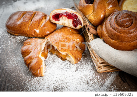 Fresh pastries buns wicker basket rustic style bakery 139609325