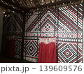 Authentic Indonesian Home Interior featuring Ornate Woven Bamboo Panel 139609576