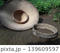 A reversed traditional farmer hat called Caping with its woven bamboo head ring in Java, Indonesia 139609597