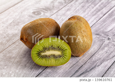 Juicy sweet and sour green kiwi 139610761