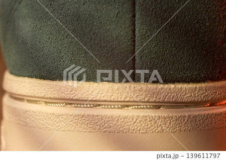 Precise stitching reveals high manufacturing standards. Inspection uncovers meticulous assembly and production quality details Precise stitching reveals high manufacturing standards. Inspection uncovers meticulous assembly and production quality details 139611797