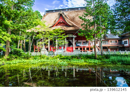 鶴岡市 出羽三山神社 三神合祭殿を鏡池越しに観る 鶴岡市 出羽三山神社 三神合祭殿を鏡池越しに観る 139612145