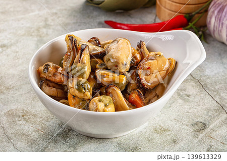Canned mussels in oil and spices Canned mussels in oil and spices 139613329