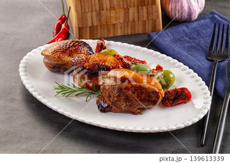 Roasted duck medallion with dry tomato Roasted duck medallion with dry tomato 139613339