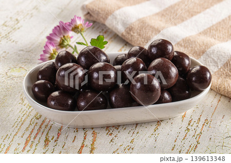 Nut in chocolate balls sweet candy Nut in chocolate balls sweet candy 139613348
