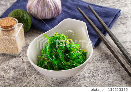 Green raw chuka seaweed salad Green raw chuka seaweed salad 139613356