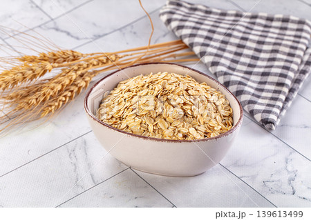 Dry oat flakes for porrige Dry oat flakes for porrige 139613499