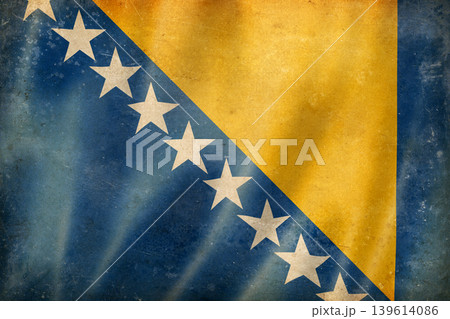 Old vintage flag of Bosnia and Herzegovina, worn and stained 139614086