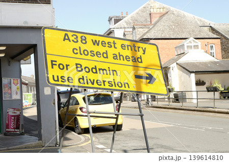 Assorted road signs being used in a UK town in 2026, some temporary some permanent. Including sign for diversions and walkways 139614810
