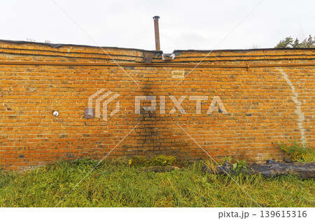 Charming and aged city boundary wall enhancing atmospheric and editorial photography themes Charming and aged city boundary wall enhancing atmospheric and editorial photography themes 139615316