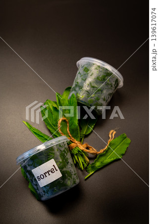 Top view fresh sorrel leaves and green herb bundle Top view fresh sorrel leaves and green herb bundle 139617074