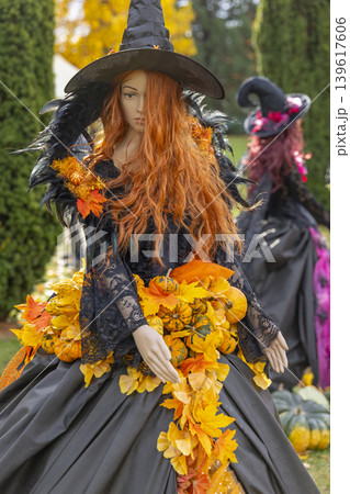 Halloween witch mannequin displaying autumn decoration in Prague Halloween witch mannequin displaying autumn decoration in Prague 139617606