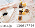 クッキーやマドレーヌなどのお菓子とコーヒー 139617756