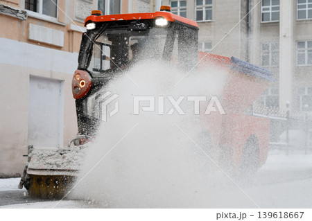 Compact municipal snow sweeper with rotary brush . Snow removal concept 139618667