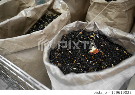 Flavored tea in paper bags . Assorted tea leaves in paper bags Flavored tea in paper bags . Assorted tea leaves in paper bags 139619022