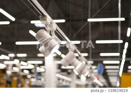 Modern track lighting system mounting ceiling spotlights for commercial illumination . Modern track lighting system mounting ceiling spotlights for commercial illumination . 139619029