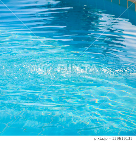 Powerful Water Jet Filling a Pool, Captivating Splash and Flow Creating a Refreshing Oasis Under the Sun 139619133