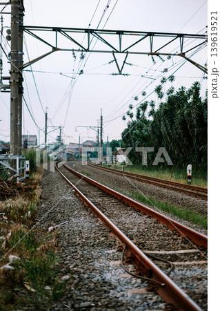 KRL railway tracks extending through urban transportation route KRL railway tracks extending through urban transportation route 139619521