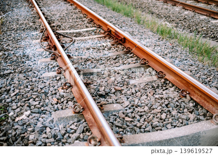 KRL commuter railway route under bright daylight 139619527