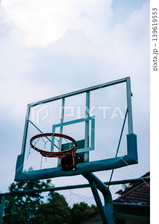 Street basketball hoop against clear blue sky Street basketball hoop against clear blue sky 139619553
