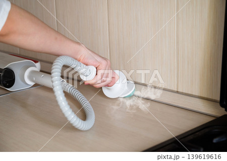 Achieve Efficient and Thorough Cleaning with Power Scrubber in Your Modern Kitchen Space 139619616