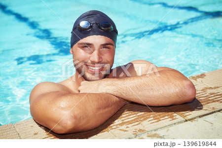 Man, portrait and swimming pool athlete or smile at performance practice, challenge or training. Male person, face and water sport cardio or fitness workout for muscle exercise, health or competition Man, portrait and swimming pool athlete or smile at performance practice, challenge or training. Male person, face and water sport cardio or fitness workout for muscle exercise, health or competition 139619844