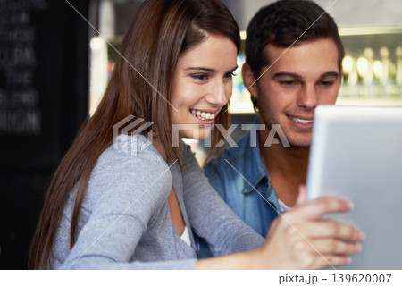 Tablet, smile and couple reading online news announcement, social network blog and scroll on digital album. Happiness, communication and marriage people on video call, app search or review media post 139620007