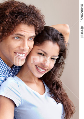 Couple, commitment and hugging in studio, love and bonding in relationship on brown background. Happy people, loyalty and support in embrace, security and trust in marriage or care in partnership Couple, commitment and hugging in studio, love and bonding in relationship on brown background. Happy people, loyalty and support in embrace, security and trust in marriage or care in partnership 139620048