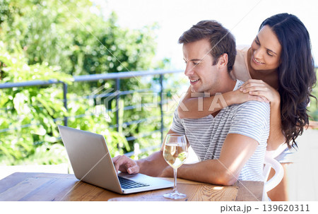Happy couple, love and outdoor by laptop on table, champagne and positive as freelancer in typing proposal. Man, woman and smile by pc in online business, wellness and hugging entrepreneur by drink Happy couple, love and outdoor by laptop on table, champagne and positive as freelancer in typing proposal. Man, woman and smile by pc in online business, wellness and hugging entrepreneur by drink 139620311