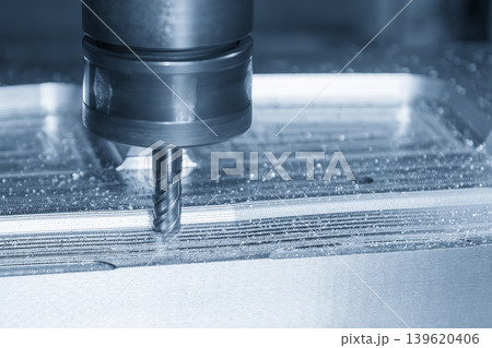 Heavy-duty rough cutting process on mold parts...の写真素材 [139620406] - PIXTA