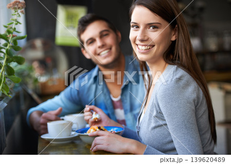 Smile, portrait and couple eating in cafe, love and bonding together on valentines day date in the morning. Happy face, man and woman in restaurant with breakfast coffee drink, food and relationship 139620489
