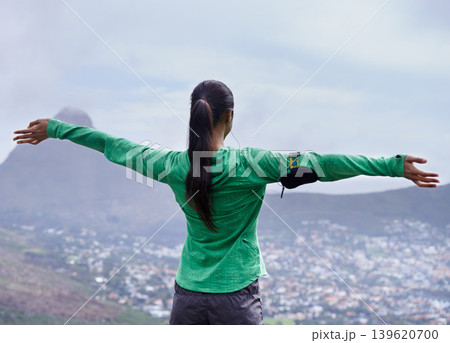 Hiking, achievement and back of woman on mountain with pride, freedom and celebration in nature of Cape Town. Outdoor, fitness and person with success in landscape on hill with skyline of city Hiking, achievement and back of woman on mountain with pride, freedom and celebration in nature of Cape Town. Outdoor, fitness and person with success in landscape on hill with skyline of city 139620700