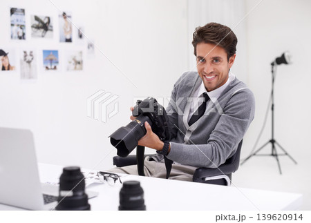 Man, editor and photography in office with portrait, checking image design and creativity in workplace. Person, smile on face and glasses for production in technology and digital photoshoot in agency Man, editor and photography in office with portrait, checking image design and creativity in workplace. Person, smile on face and glasses for production in technology and digital photoshoot in agency 139620914