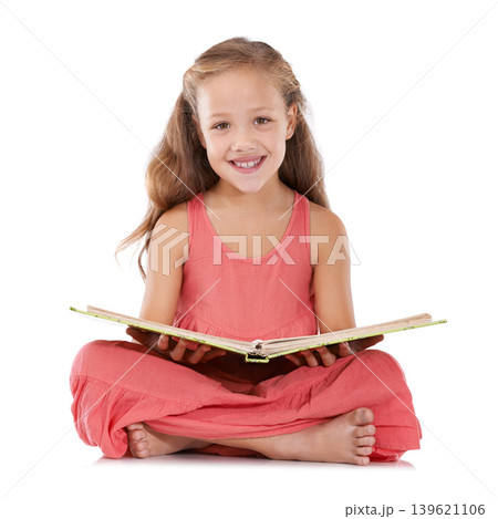 Portrait, happy and child reading books in studio for learning, language development and studying knowledge on white background. Young girl, kid and sitting on floor for story, education and literacy Portrait, happy and child reading books in studio for learning, language development and studying knowledge on white background. Young girl, kid and sitting on floor for story, education and literacy 139621106