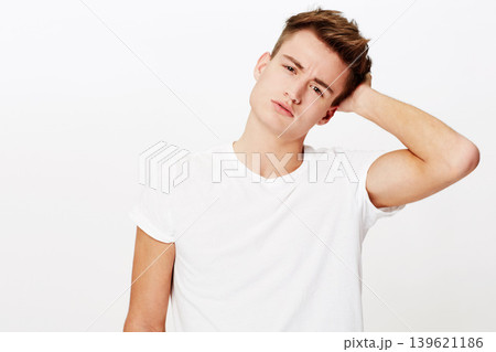 Confused, thinking and portrait of man scratching head in studio with why, asking or unsure on white background. Doubt, face and male model with questions, puzzled or gesture for guess, huh or memory 139621186