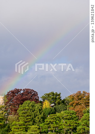 Rainbow on the sky from the view of nijo jo castle, Kyoto, Japan. World Heritage Site. Major tourist attraction in Kansai region in Japan. Japan famous historic architecture. Nature scene. Rainbow on the sky from the view of nijo jo castle, Kyoto, Japan. World Heritage Site. Major tourist attraction in Kansai region in Japan. Japan famous historic architecture. Nature scene. 139621842