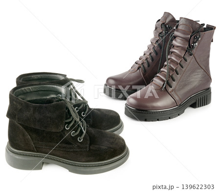 Pair of Leather and Suede Winter Boots Isolated on White Pair of Leather and Suede Winter Boots Isolated on White 139622303