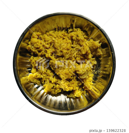 Yellow turmeric rice in a stainless steel bowl isolated on white background. Yellow turmeric rice in a stainless steel bowl isolated on white background. 139622328