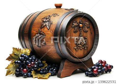 Vintage oak wine barrel with decorative features and grapes on white background Vintage oak wine barrel with decorative features and grapes on white background 139622531