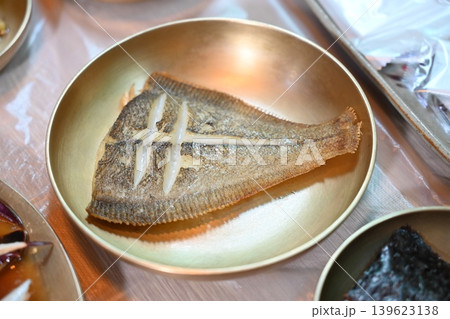 Pan Fried Flounder Served in Traditional Korean Brass Bowl 139623138