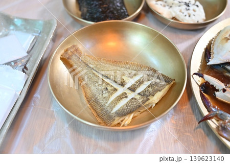 Pan Fried Flounder Served in Traditional Korean Brass Bowl Pan Fried Flounder Served in Traditional Korean Brass Bowl 139623140