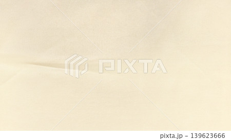 organic cream linen fabric gently wrinkled with soft folds reveals intricate natural weave in serene minimalist closeup organic cream linen fabric gently wrinkled with soft folds reveals intricate natural weave in serene minimalist closeup 139623666